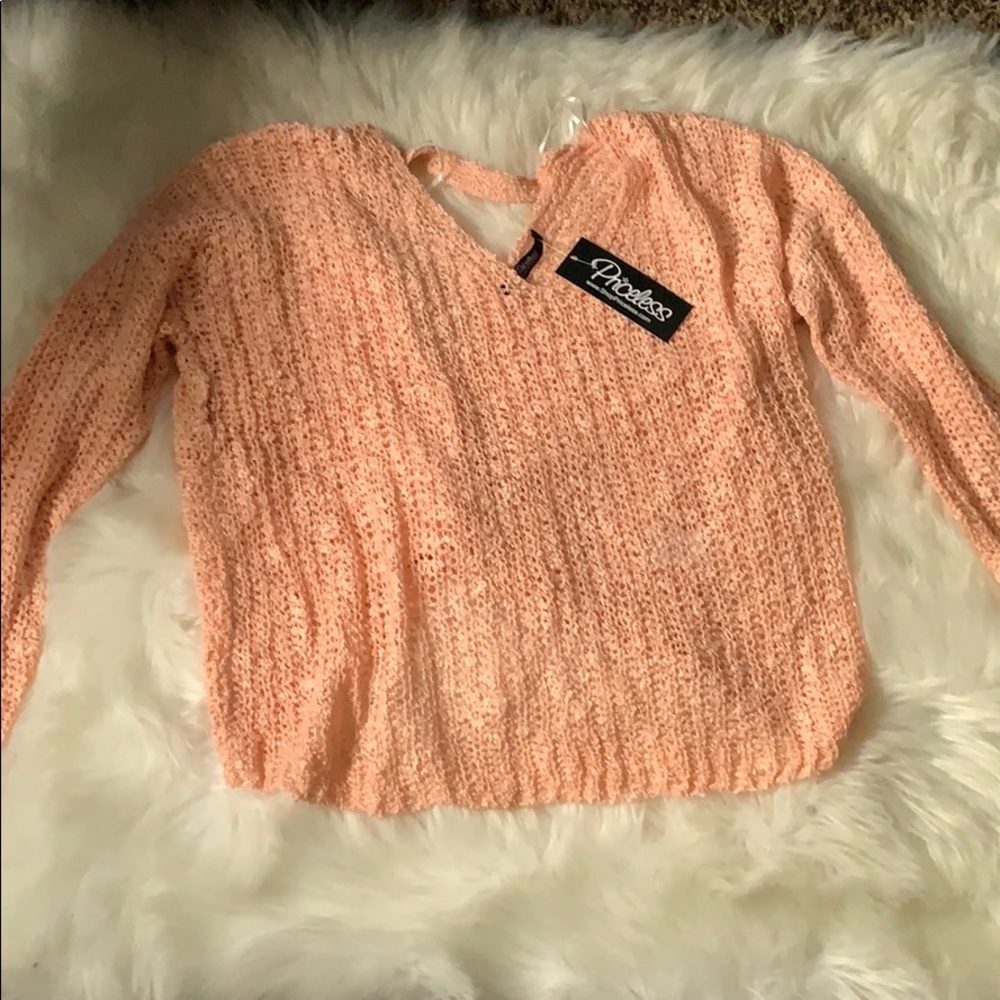Shop Priceless Peach twist back sweater